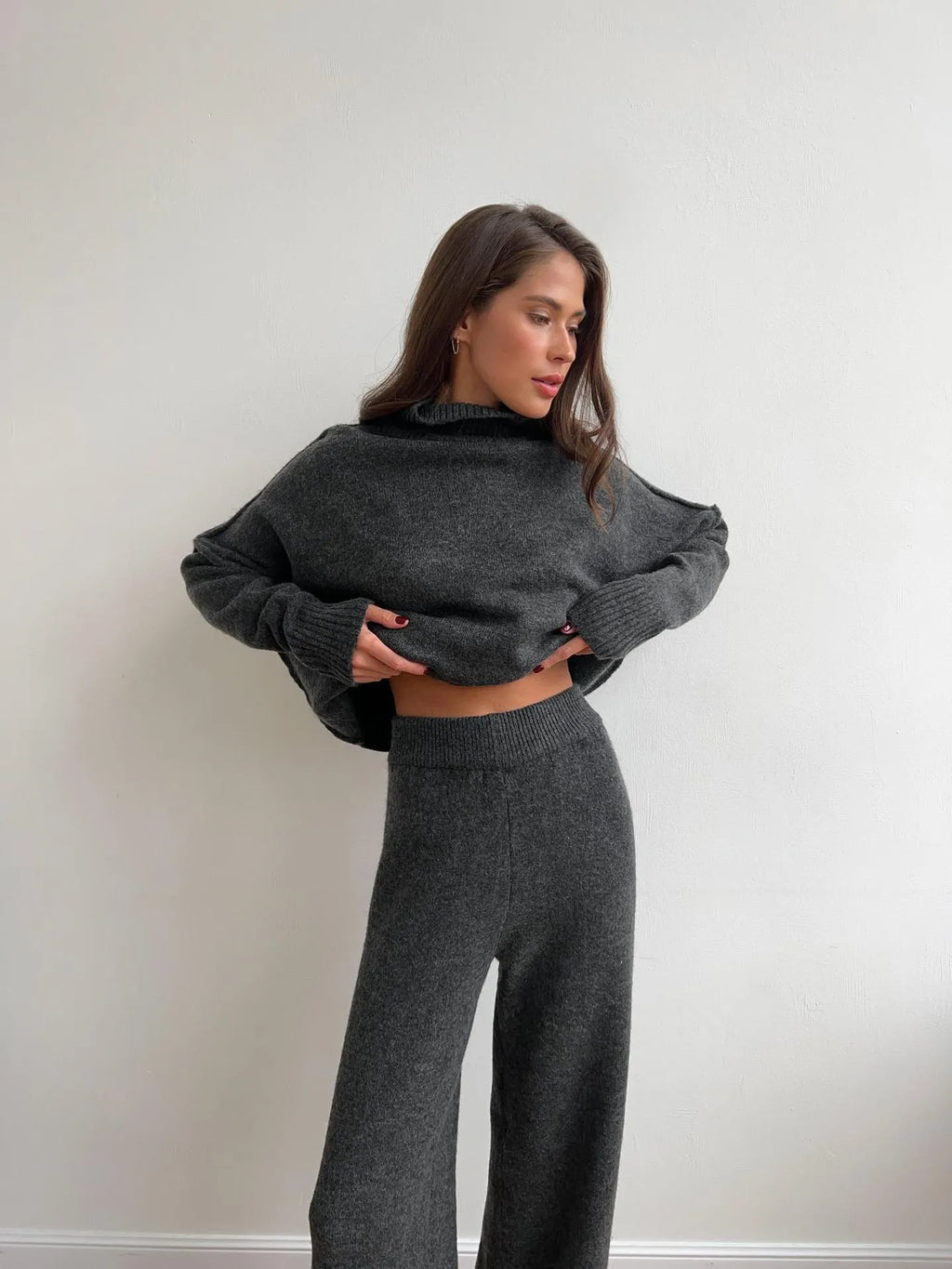 Women's side-slit sweater suit set with matching trousers in solid pattern design