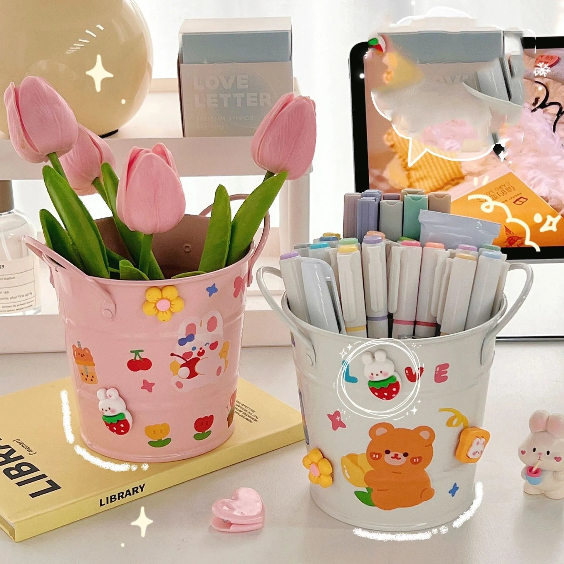 Round metal pen holder in various colours showing solid and sticker patch design options