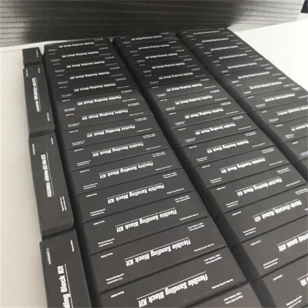 Seven frosted black EVA building blocks with metal construction for architectural modelling