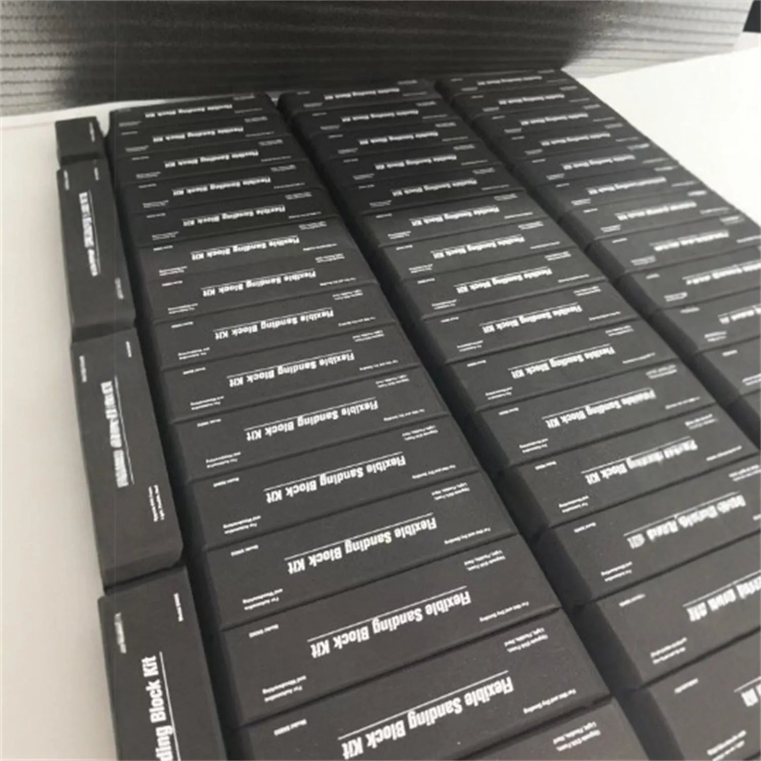 Seven frosted black EVA building blocks with metal construction for architectural modelling