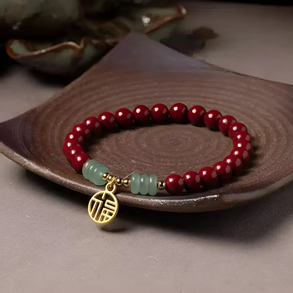 Wave-shaped bracelet with cinnabar segments and copper beads in national style design