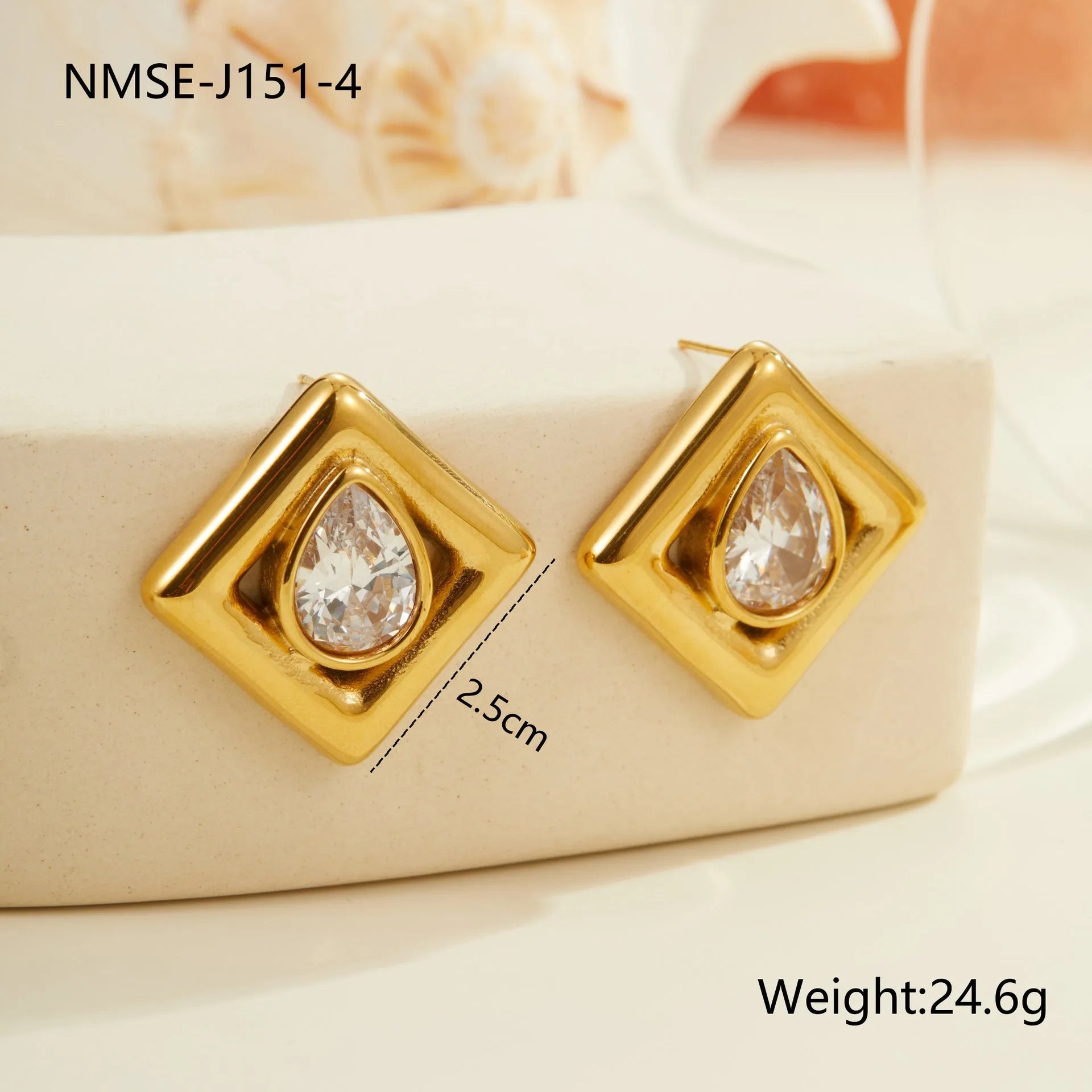 Gold-tone geometric stud earrings with inlaid water drop zircon stones on stainless steel