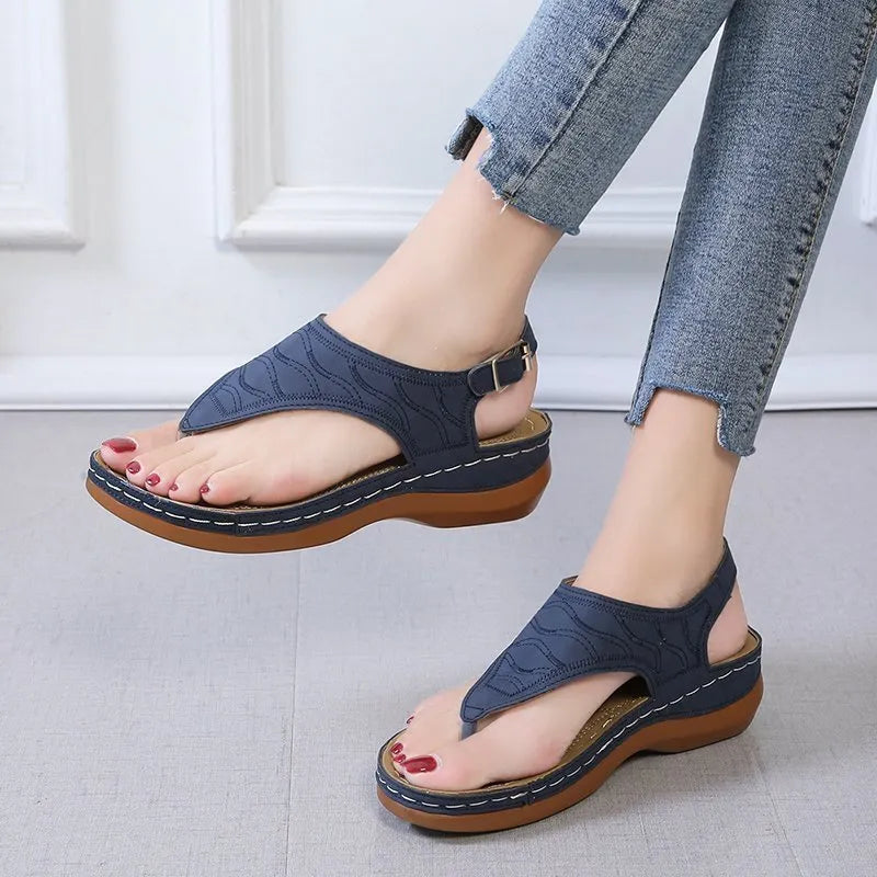 Women's wedge heel flip flop sandals with adjustable buckle strap in solid colours