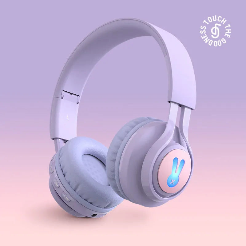 Wireless children's headphones with RGB bunny ear lights in purple colour showing stereo sound and call functionality