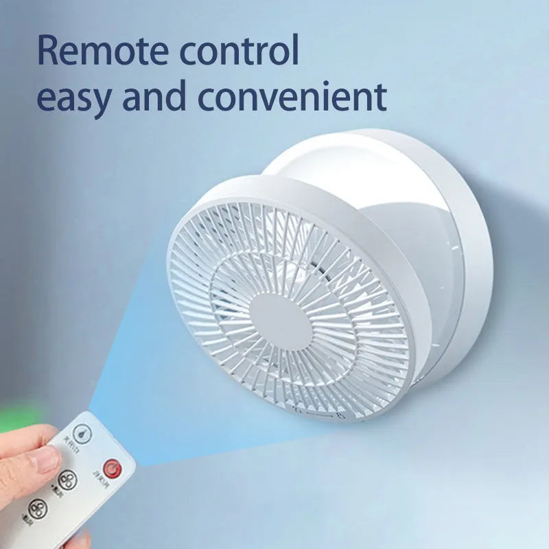 White portable rechargeable folding fan with night light and remote control on a desk