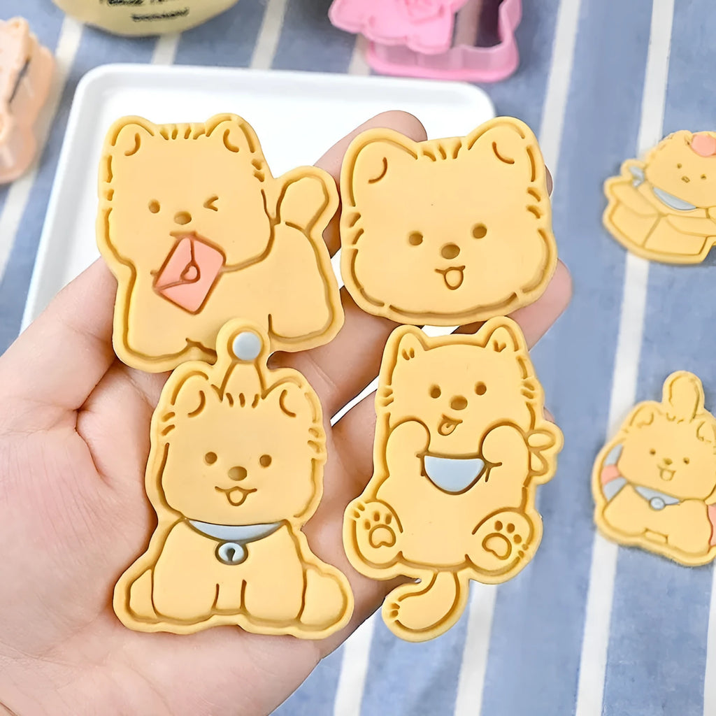 Three-dimensional plastic biscuit mould with dog-themed cartoon designs