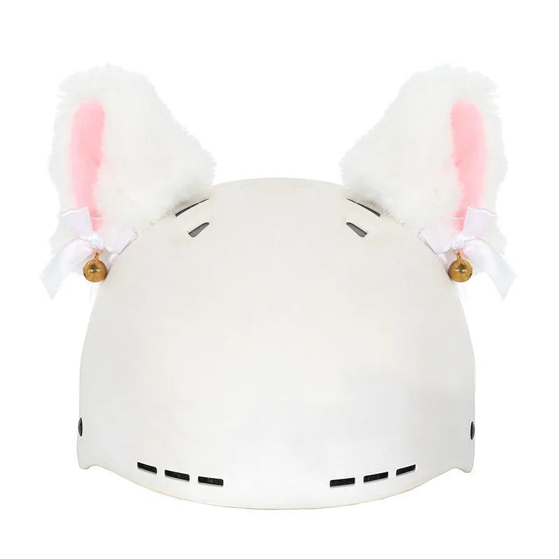 Plush fabric cartoon character decoration cover on a ski helmet