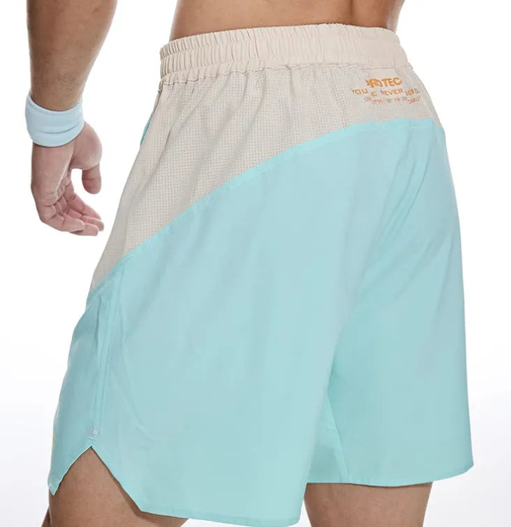 Men's loose grey Hipp style workout shorts for gym lifting with elasticated lace-up waistband
