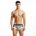 Men's cotton low-waist boxers in red, dark blue, and light grey colours showing hip-lifting design