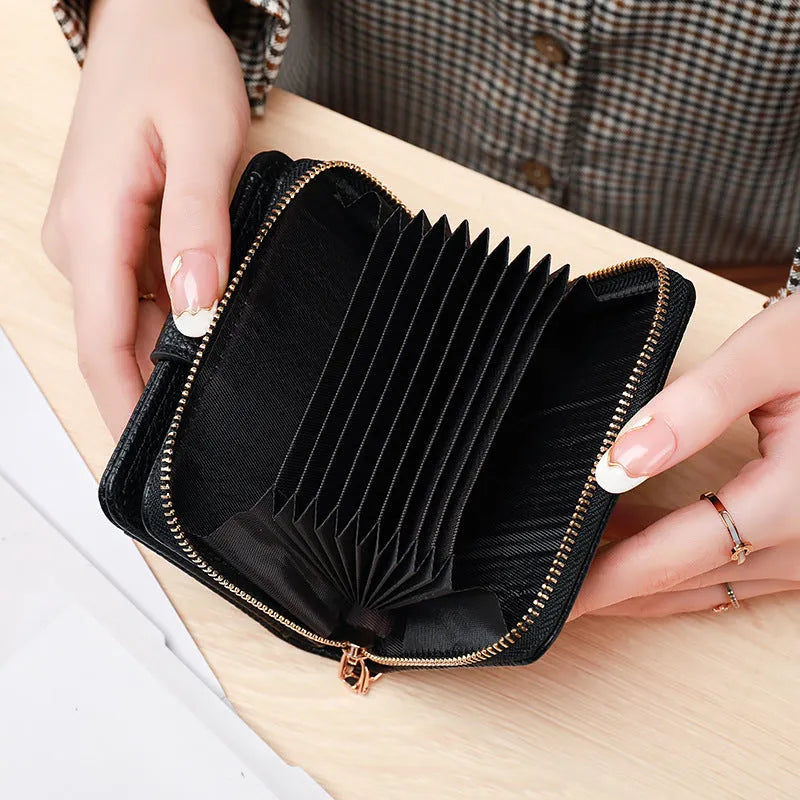 Lychee pattern textured ladies' two-fold short wallet in beige, pink, black, and red colour options.