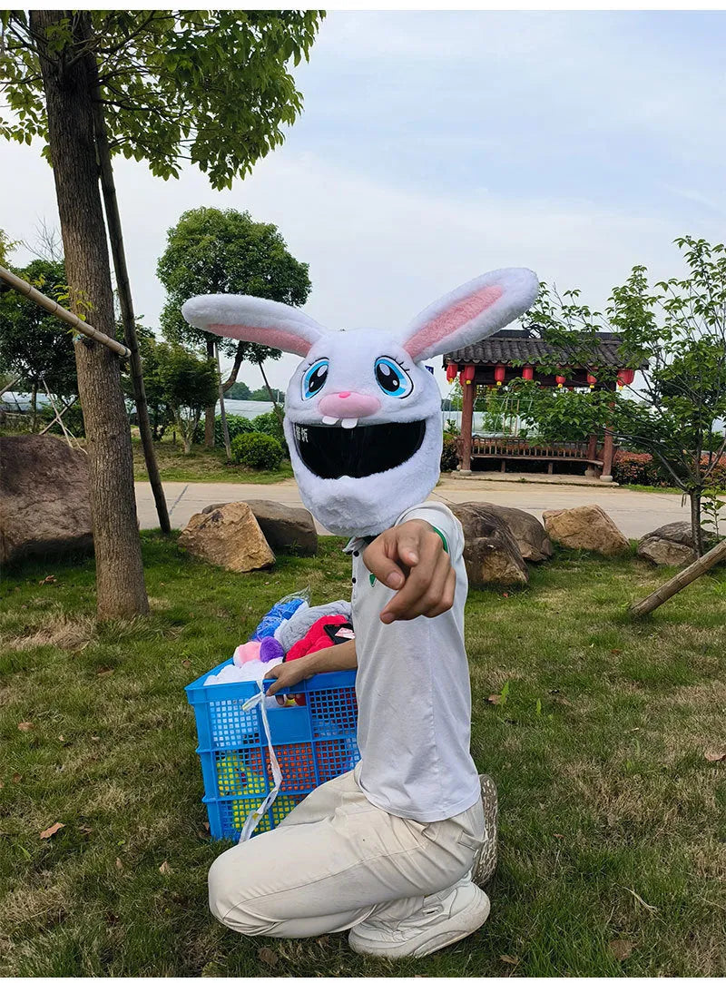 White rabbit head plush cover for motorcycle helmet with long ears.