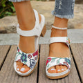 White women's casual high heel sandals with a Velcro strap buckle on a rubber sole.