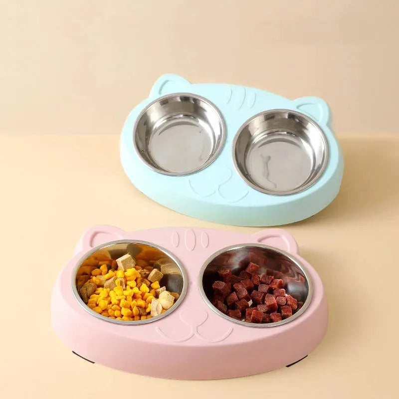 Blue macaron-shaped plastic pet feeding tray with two bowls and non-slip rubber feet