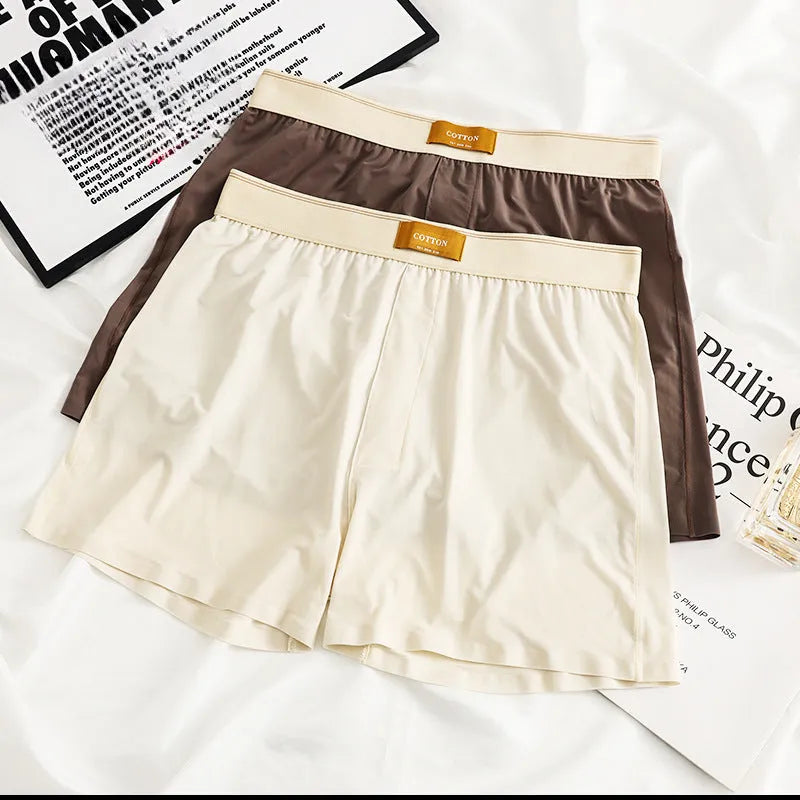 A pack of three pairs of solid colour men's ice silk loose fit boxer shorts.