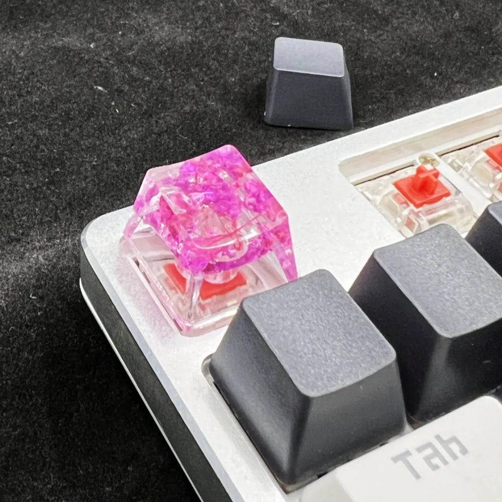 Transparent resin mechanical keyboard keycap with starry sky design in four colour options