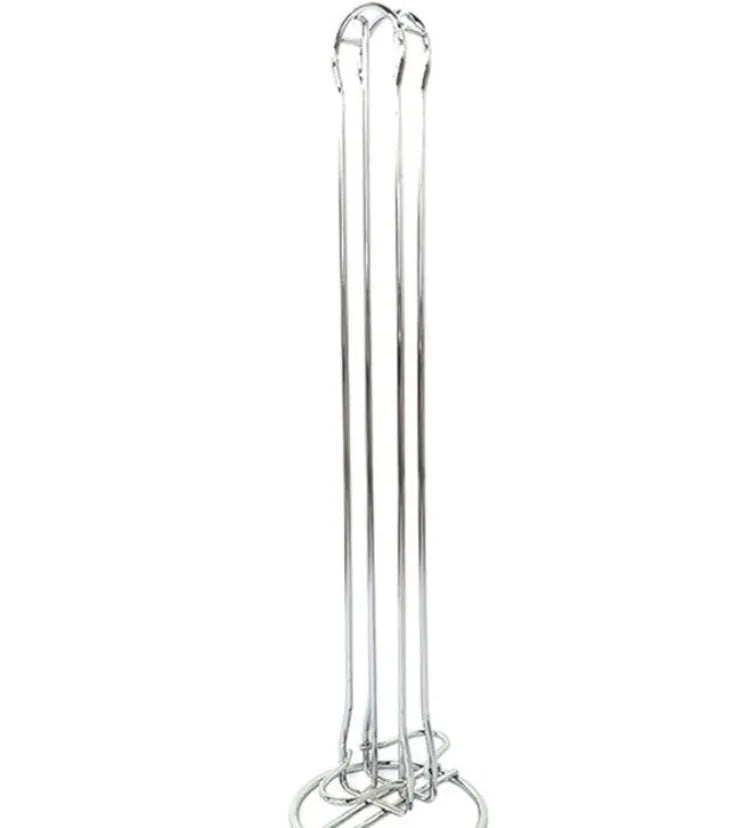 Modern wrought iron coffee capsule storage rack holding pods on display shelves