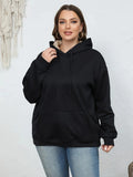 Women's loose fit hooded sweater in thick grey polyester fleece with a 3D pattern and front pockets.