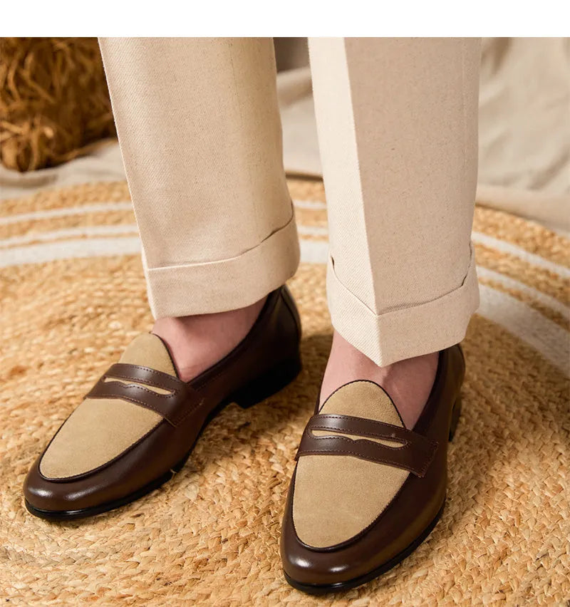 Coffee grey suede slip-on loafers with a rubber sole shown from the side.