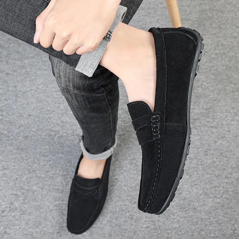 Men's solid colour suede loafers with a round toe and flat rubber sole