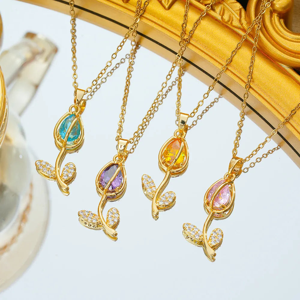 Gold electroplated tulip flower necklace with zircon stones on titanium steel chain