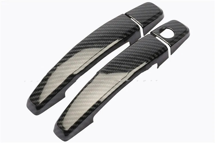 Carbon fibre pattern door handle cover for Opel Vauxhall Astra H and J models.
