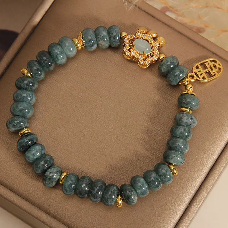 Women's natural emerald jade bracelet with abacus beads design and alloy safety lock clasp
