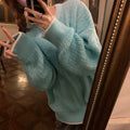 Women's loose pullover sweater in solid colours with regular sleeves