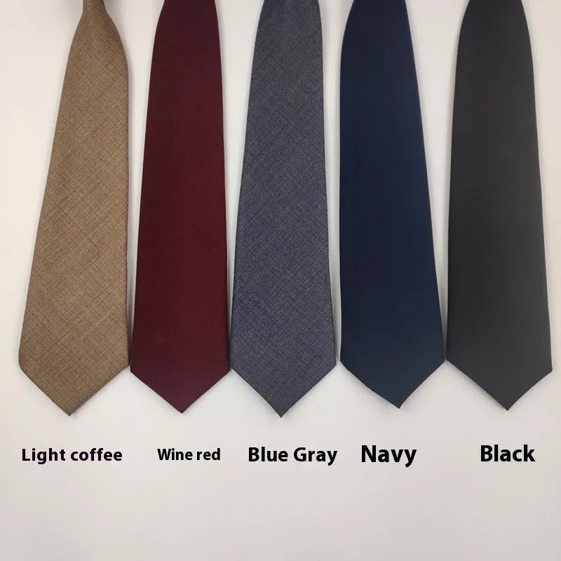 Solid colour cotton bow tie in arrow style showing navy blue option