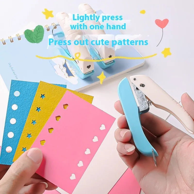 Manual handheld craft punching machine with love, star, and round dies for children's paper projects.