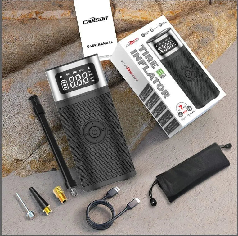 Black portable wireless air pump with USB charging cable and multiple nozzles including bicycle, swimming circle and ball attachments
