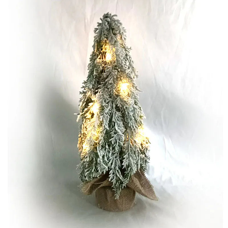 Small 24-inch white plastic Christmas tree with lights and snow sprayer decoration