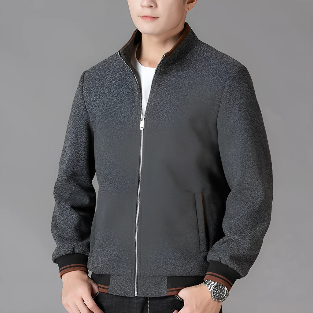 Men's grey sports-style fleece jacket with long sleeves and pockets on a hanger.