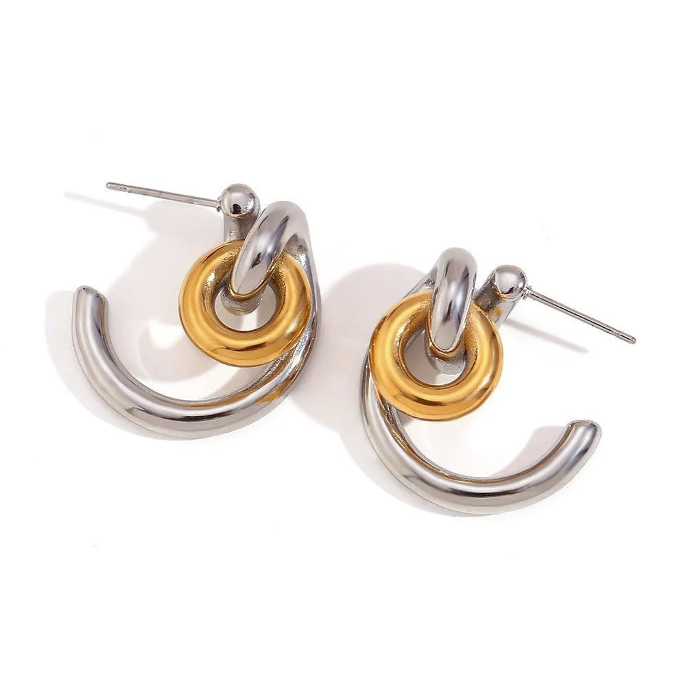Gold geometric jewellery set with earrings, bracelet and necklace on stainless steel