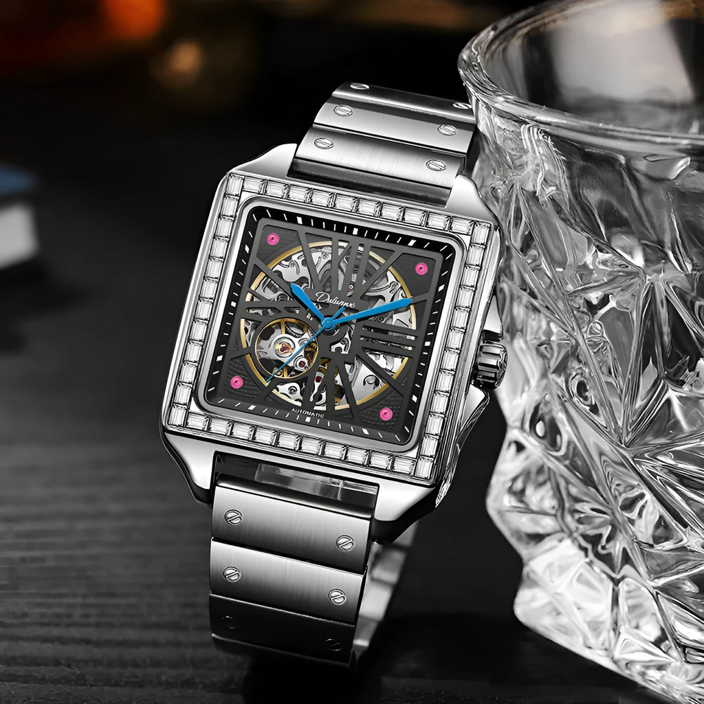 Men's square automatic watch with diamond studs on case, available in black or white with leather or steel strap.