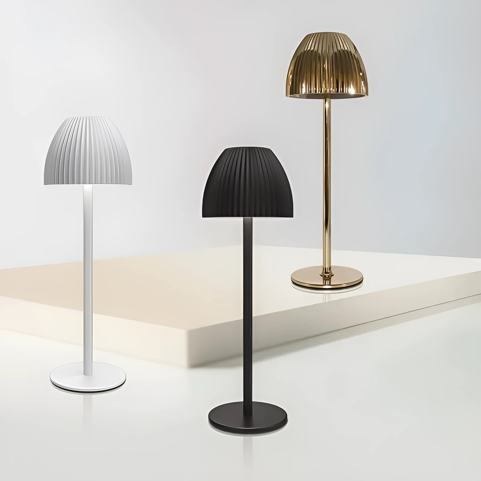 Ins pattern dimmable night lamp with thin round base in black or white, placed on a bedside table.