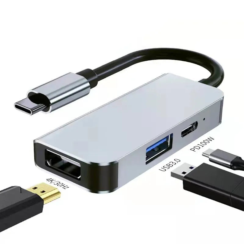 Portable USB-C expansion dock showing multiple ports including HDMI and USB connections