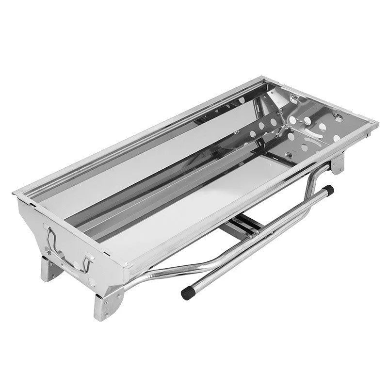 Stainless steel folding barbecue oven with cooking grill, shown in natural metallic colour.