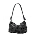 Women's crossbody bag in gold colour showing sandwich pocket design and single shoulder strap