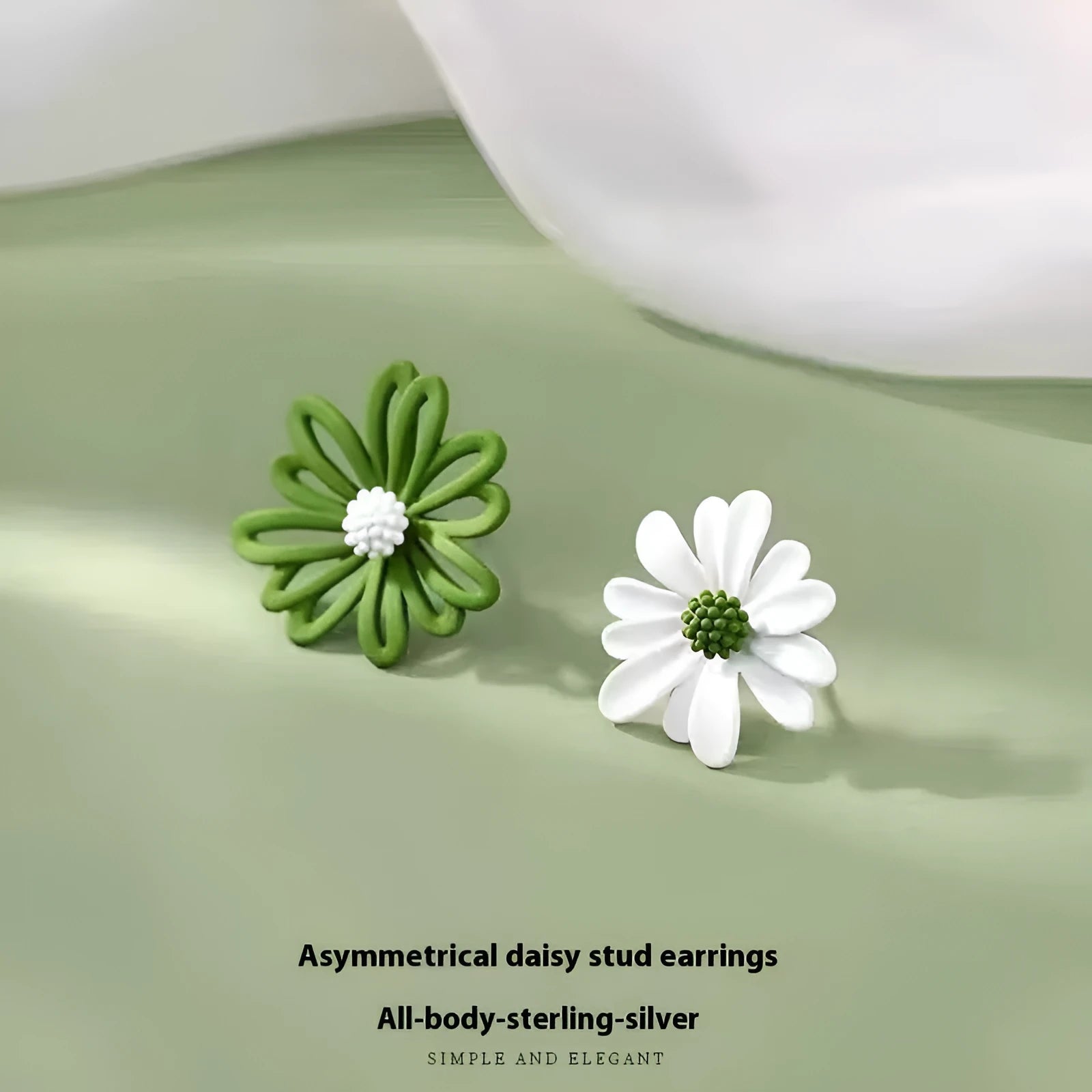 Cartoon flower stud earrings in blue and orange, white and green, or yellow and white alloy construction