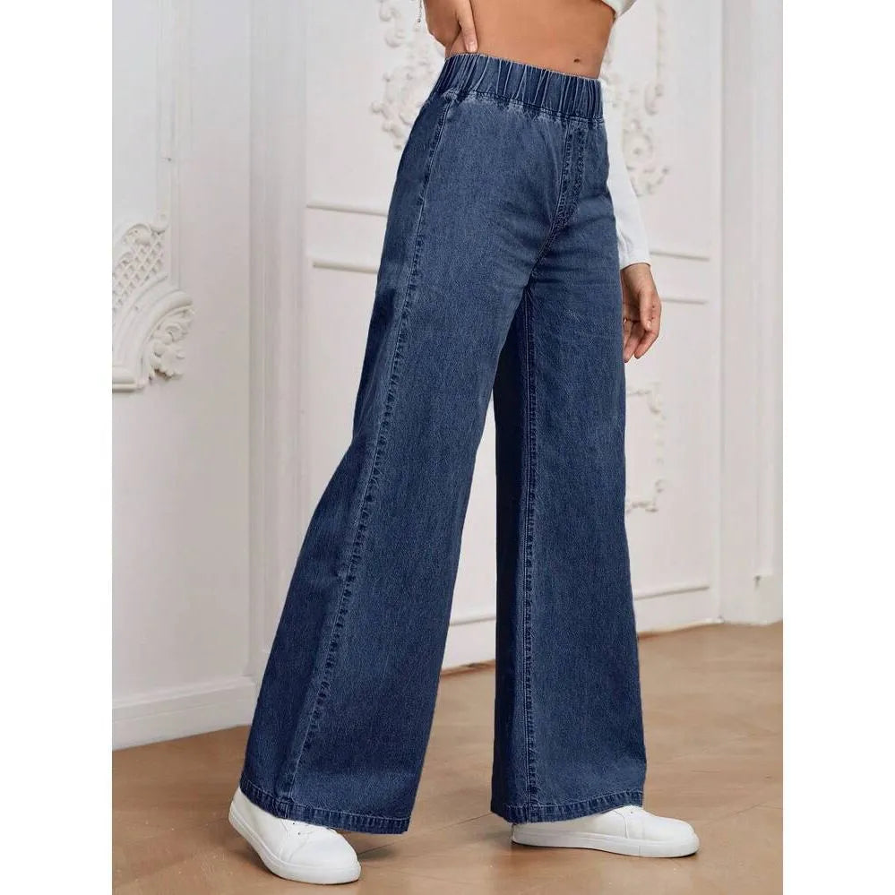 Plus size light blue washed wide-leg straight-leg jeans on a hanger.