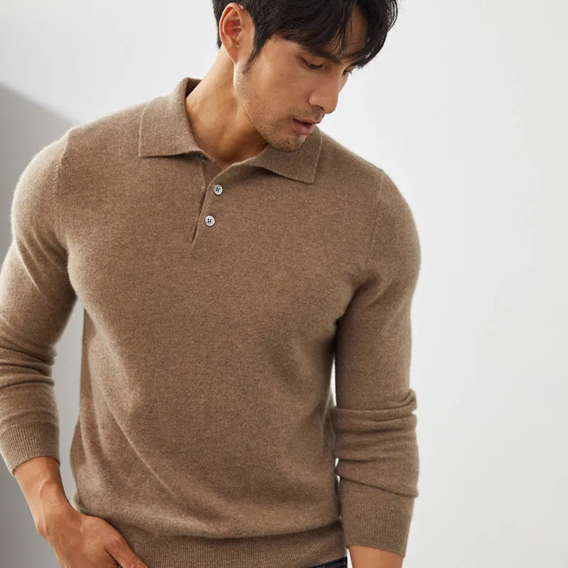 Man wearing a sapphire blue loose-fit cashmere polo collar pullover sweater.