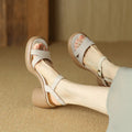Women's open toe platform sandals in milky white colour showing round toe design and rubber sole