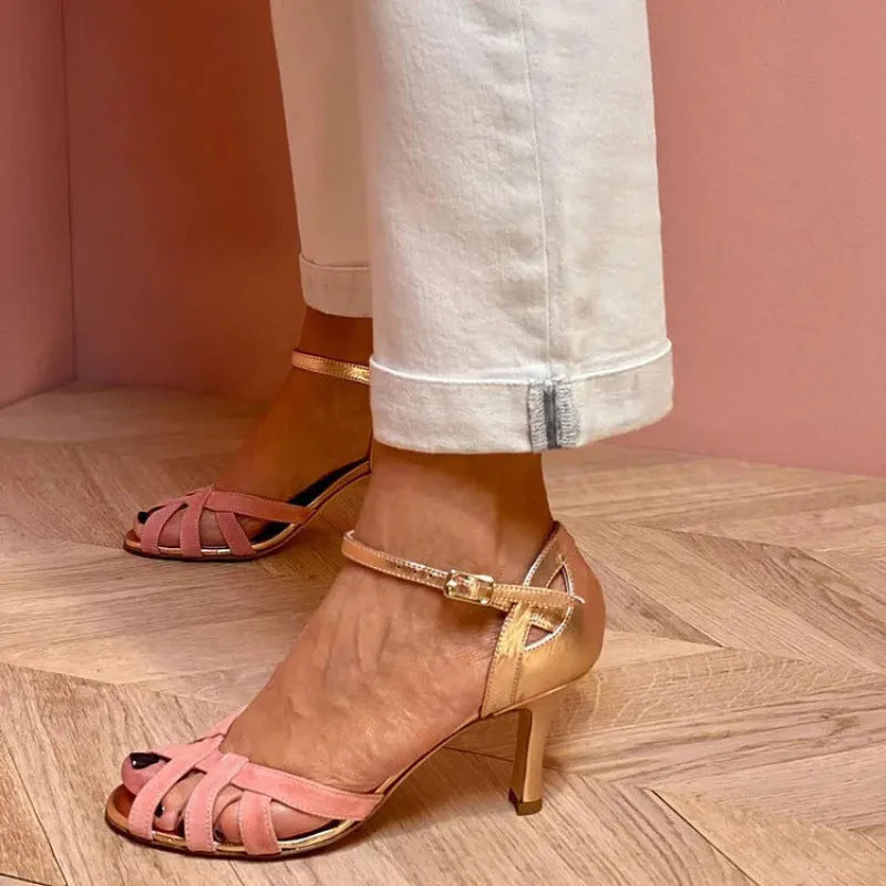 Adjustable buckle peep toe sandals on a white background, showing herringbone toe detail and strap.