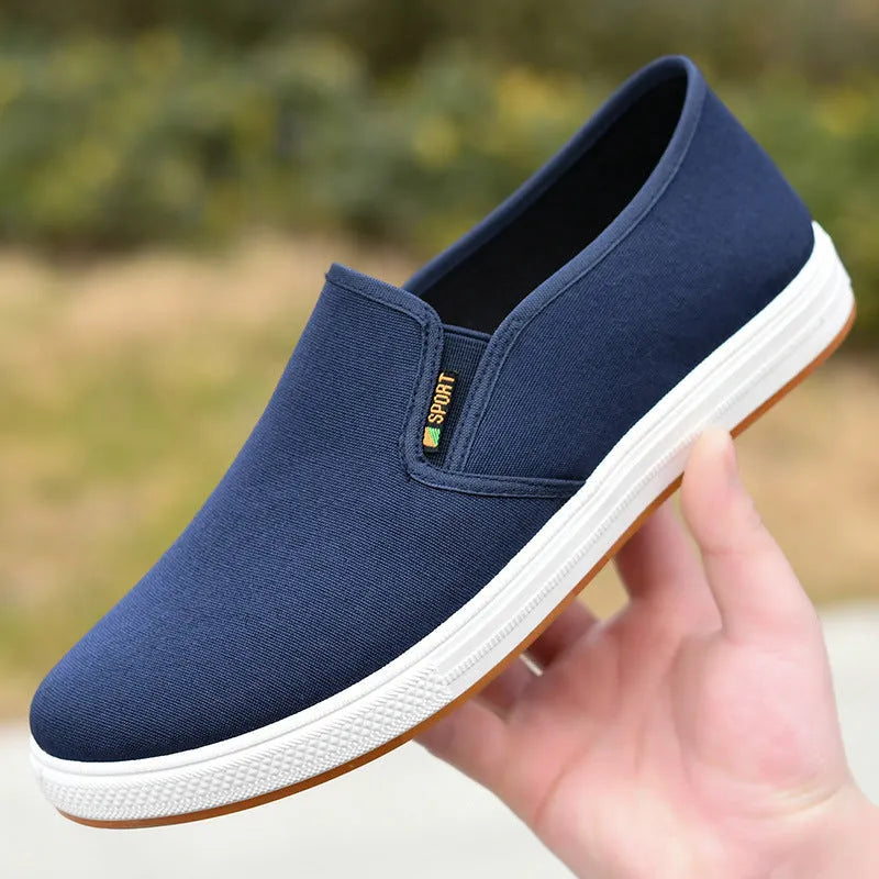 Men's black and blue canvas slip-on shoes with round toe and composite soles