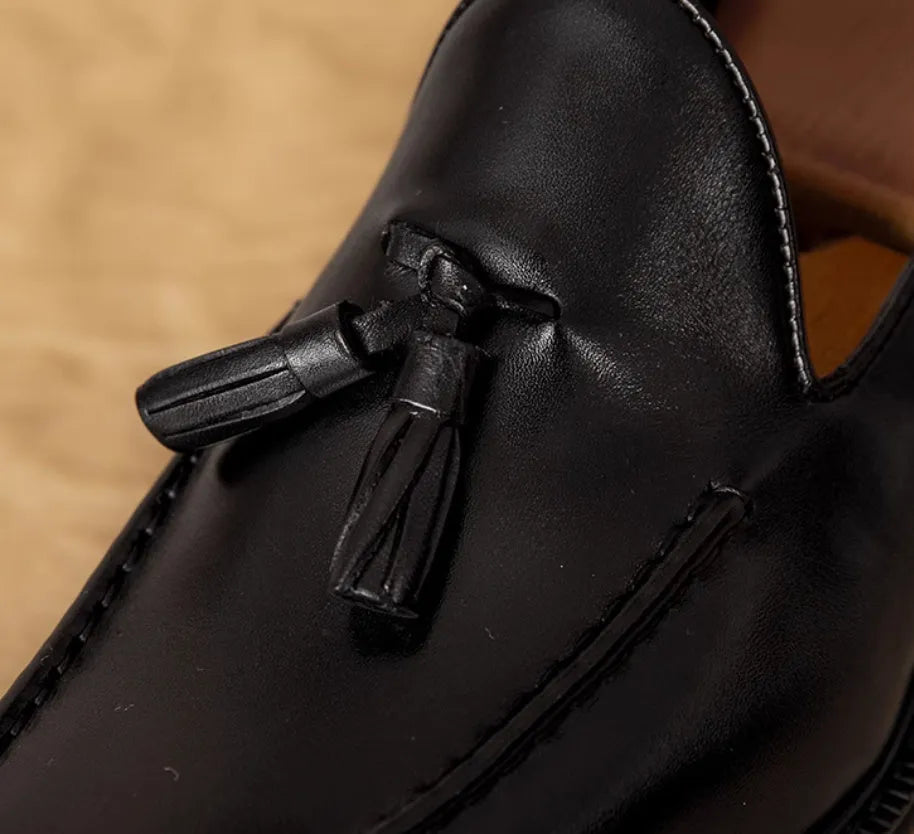 Men's genuine leather slip-on loafers in black and brown with fringed detailing and rubber soles