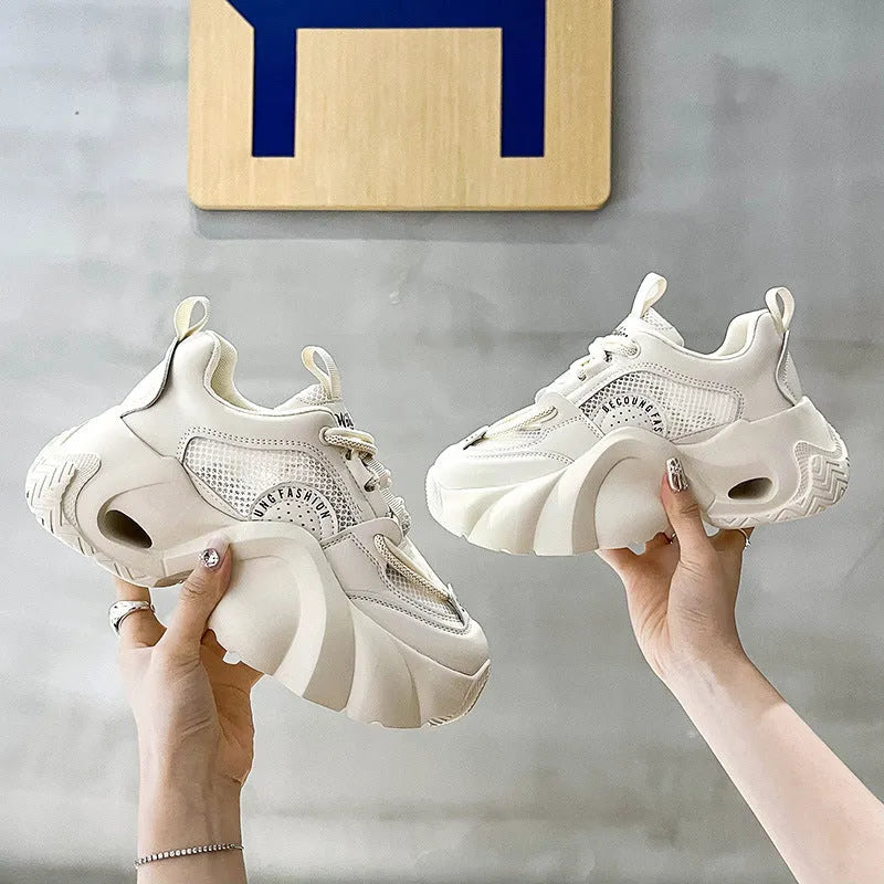 Women's beige casual sneakers with cross shoulder straps and a thick mid-heel sole