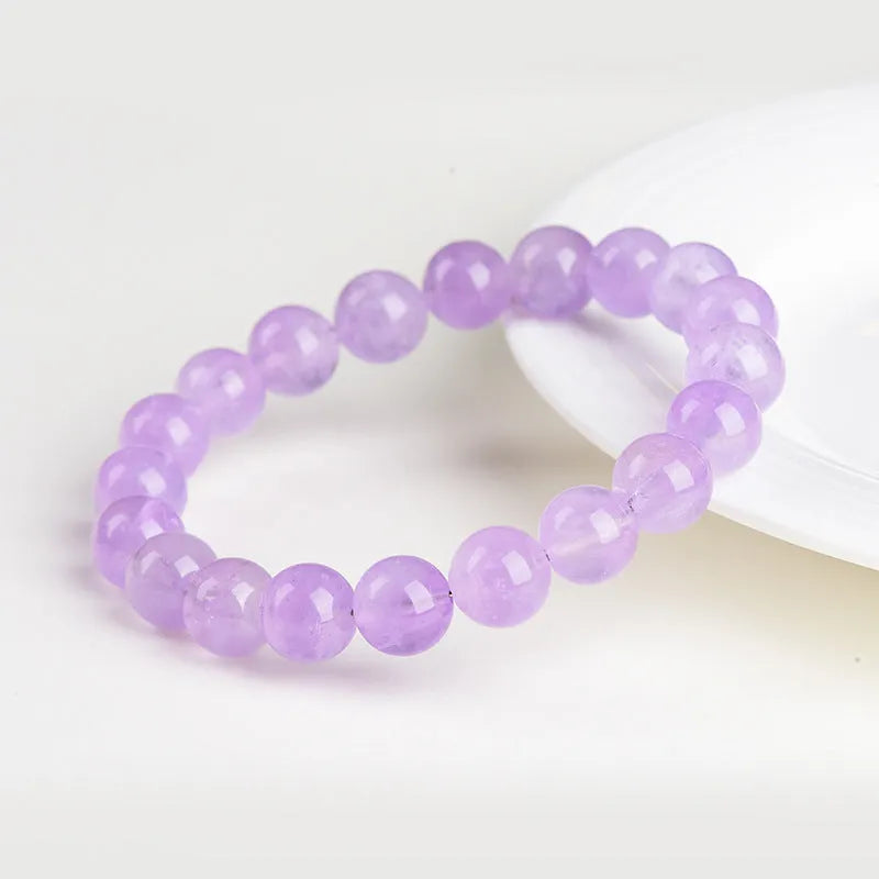 Lavender amethyst water ripple bracelet with round beads in various sizes from 6mm to 17.8mm
