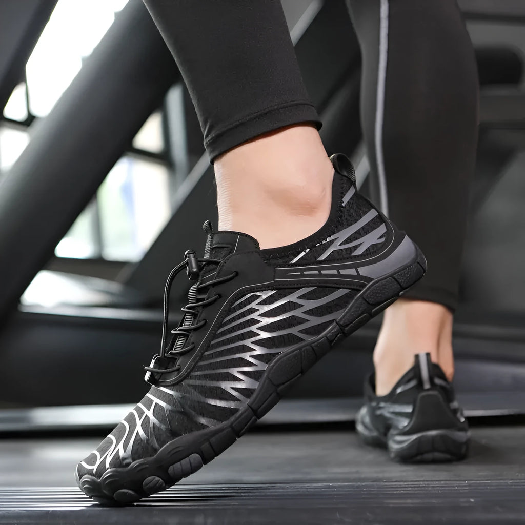Men's white Upstream lace-up casual sports shoes with a rubber sole on a plain background.