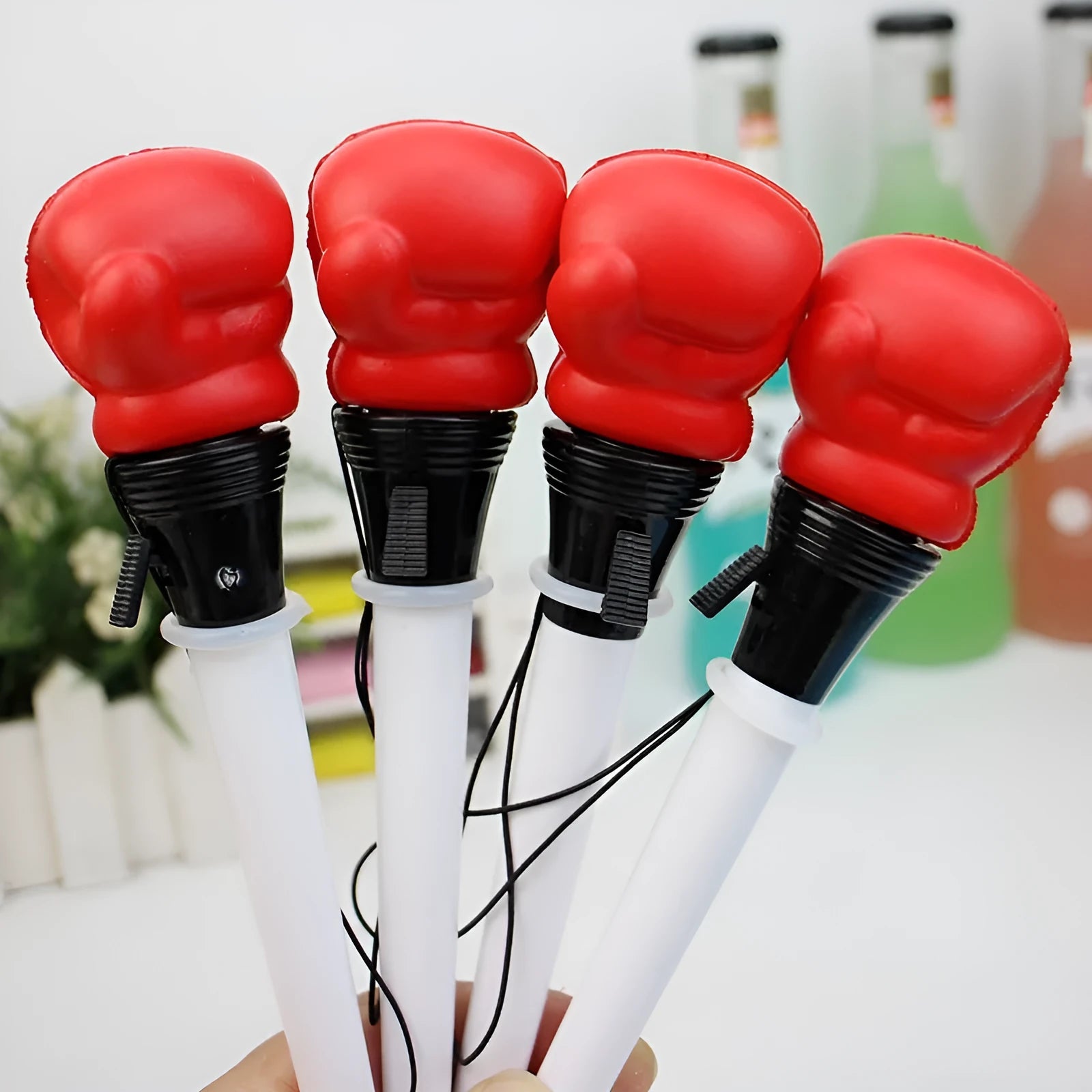 Four black ink ejection pens with pressure relief boxing press mechanism and 0.7mm bullet tips