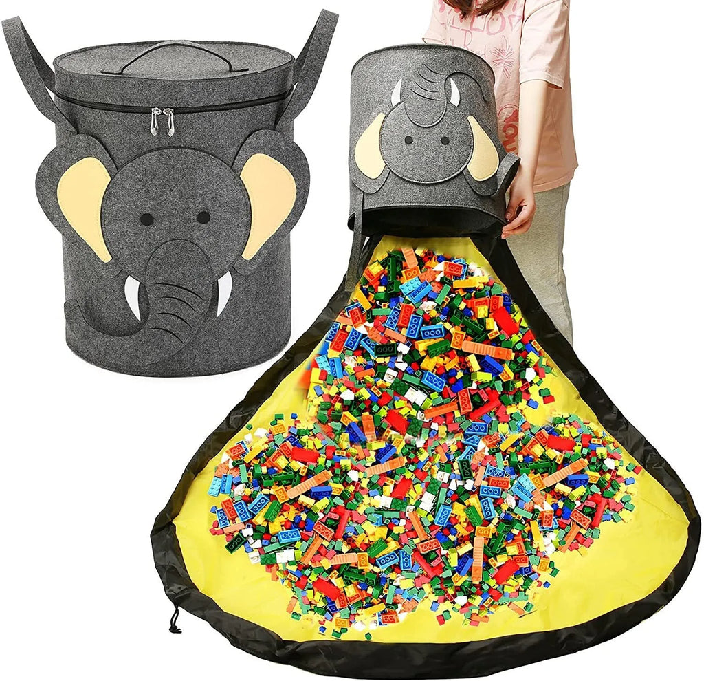 Green felt cube storage bag with a pull rope, shown unfolded as a flat play mat for toys.
